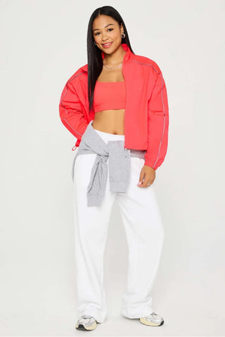 Fabletics Tempo Lightweight Windbreaker - Neon Coral
